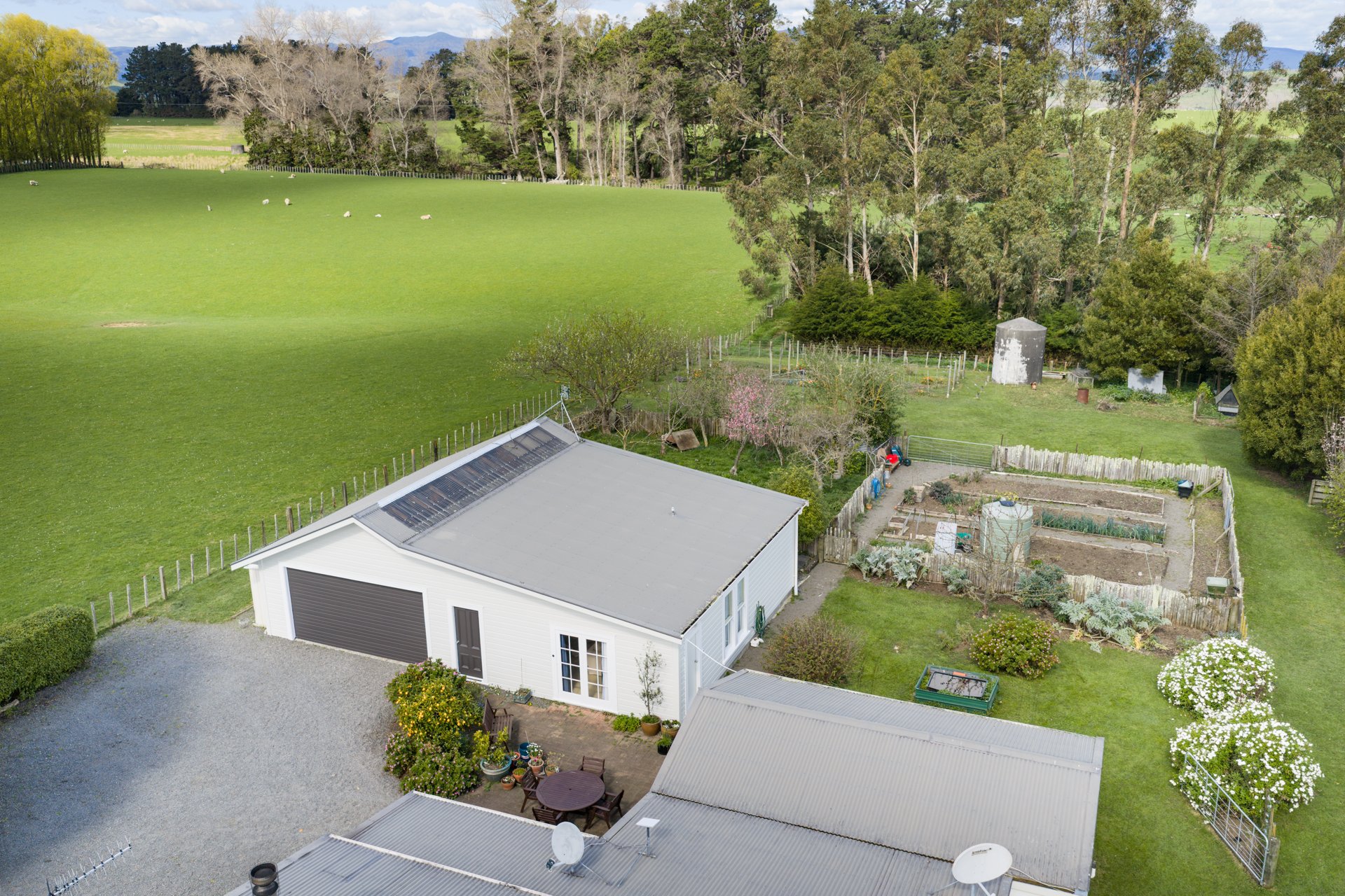 Aerial view of the 130 square metre garage and apartment building at 2114 Kimbolton Road, Kiwitea, Feilding
