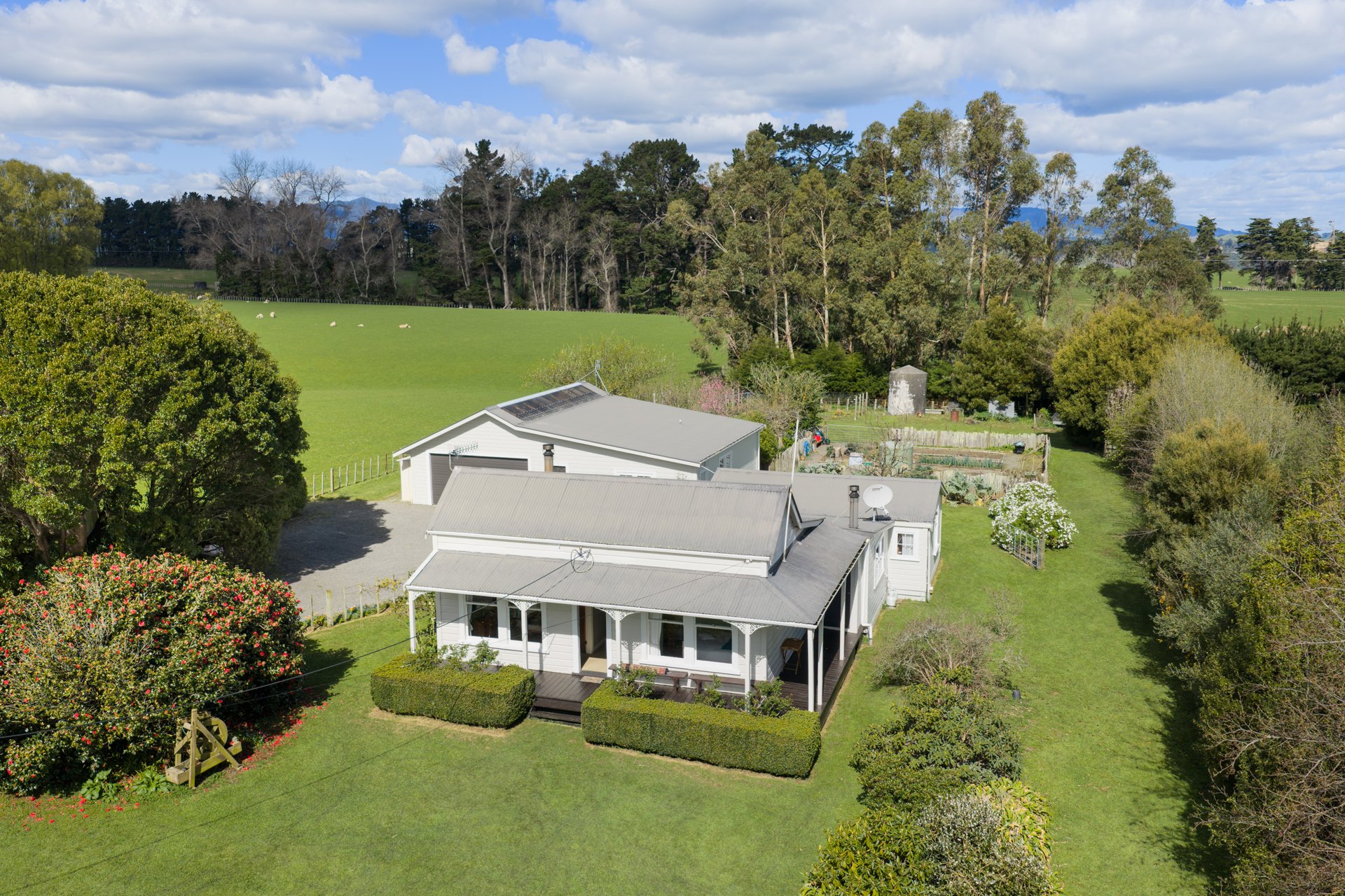 Aerial view of the villa and the apartment building behind it at 2114 Kimbolton Road, Kiwitea, Feilding